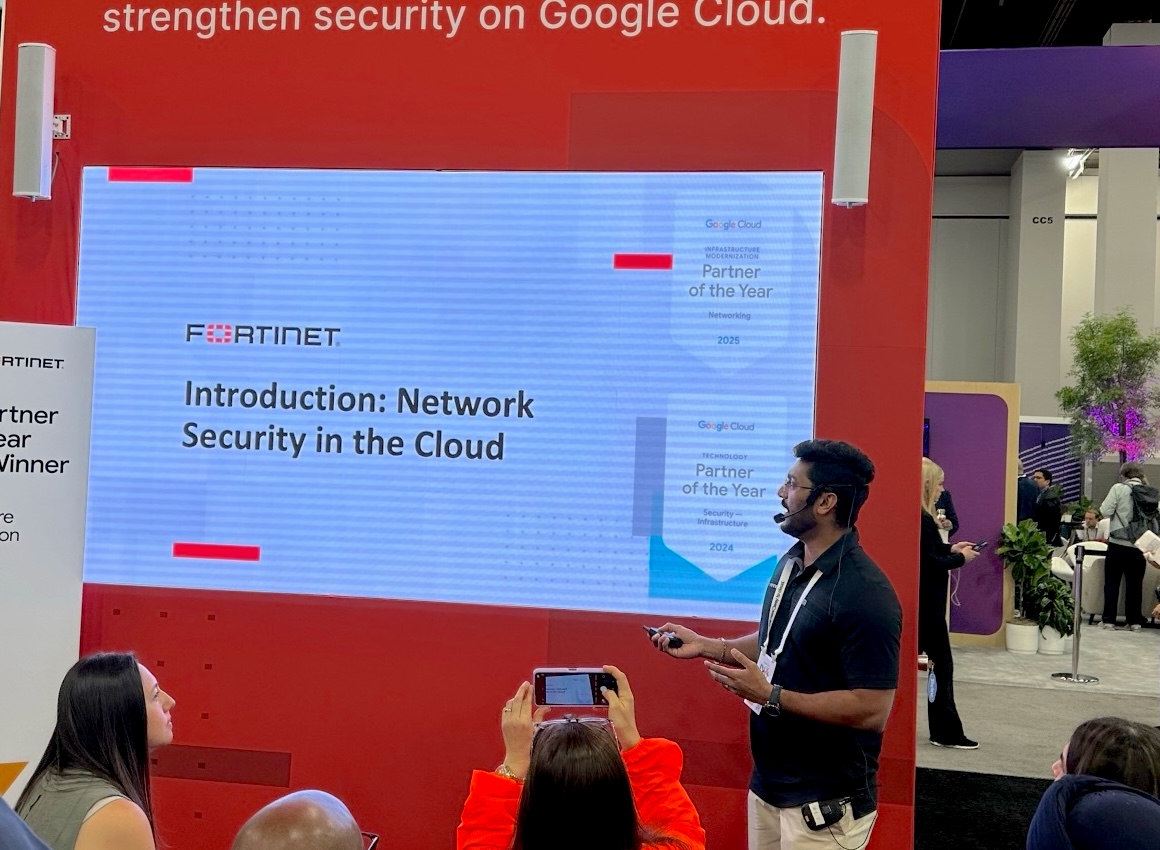 Suraj presenting network security in the cloud beside a Fortinet and Google Cloud display