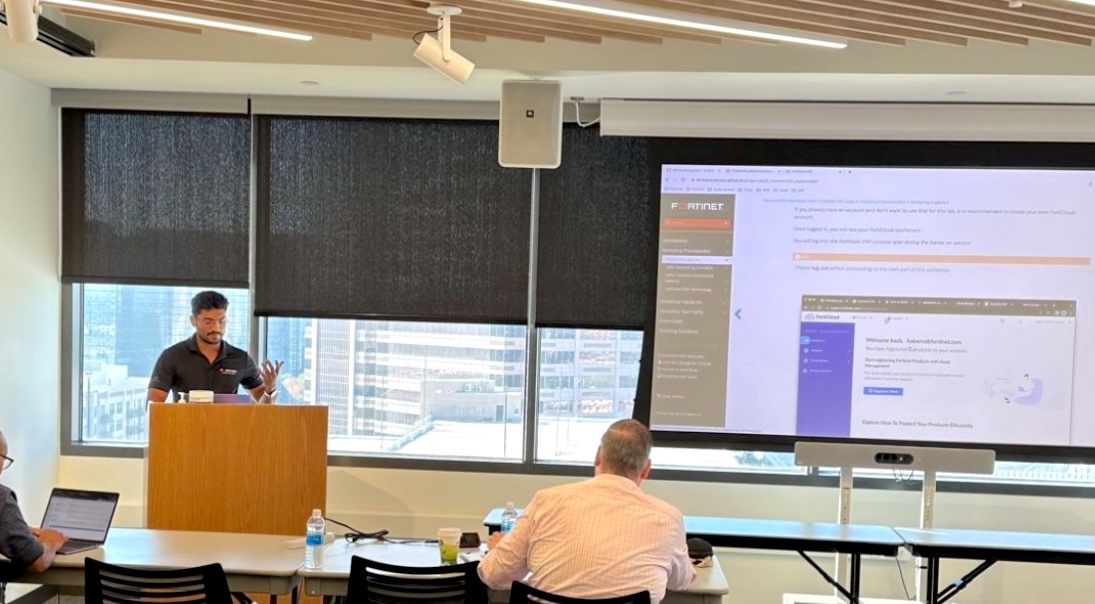 Suraj demonstrating a Fortinet interface to a small group at the AWS office in Dallas